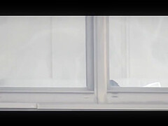 Manhattan Changing in Window