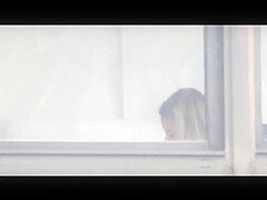 Manhattan Changing in Window