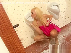 Messy bukkake on blonde slut on toilet