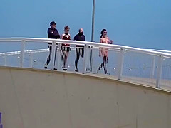Naked in fishnets slut in public