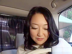Naughty Japanese milf fucks stranger in a car