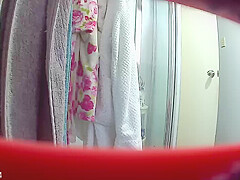 Nepalese girl showering