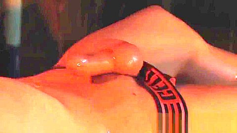 Oiled and tied up Chris Jansen receives massage and handjob