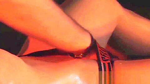 Oiled and tied up Chris Jansen receives massage and handjob