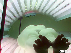 Older Milf Tanning Her Shaved Tight Pussy