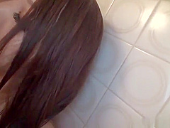 Oriental brunette taking part in sex video