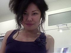 Slim arousing Chinese girl gets naughty in kitchen
