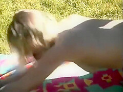 Slut And Boyfriend On The Green Grass