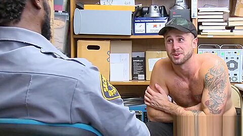 Tattooed hunk riding officers massive black dick