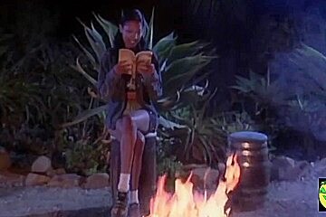 Two Attractive Lesbians Passionately Kiss And Touch Their Pussies Next To The Campfire