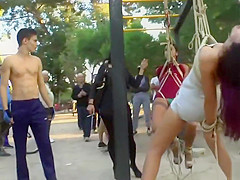 Two sluts tormented in public park gym