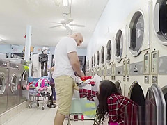 bangs busty babe in laundromat