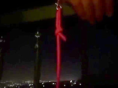 blonde gets her shaved cunt played with at the rooftop