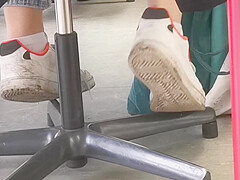 candid feet in white ankle socks and sneakers