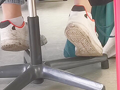 candid feet in white ankle socks and sneakers