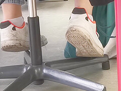 candid feet in white ankle socks and sneakers