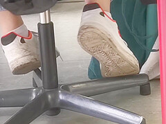 candid feet in white ankle socks and sneakers