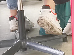 candid feet in white ankle socks and sneakers