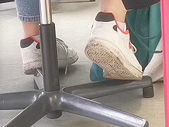 candid feet in white ankle socks and sneakers